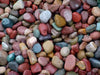 These colored landscaping rocks from Kilgore Landscape Center are called Rainbow Beach Cobbles