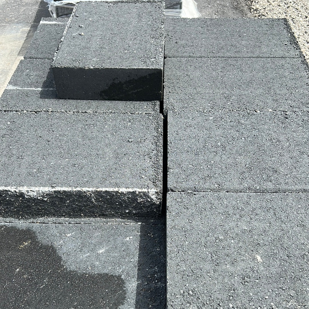 Retaining Wall Capstone 4″ Splitface Onyx Color Asphalt Materials